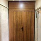 Тамбурная дверь с отделкой ламинатом