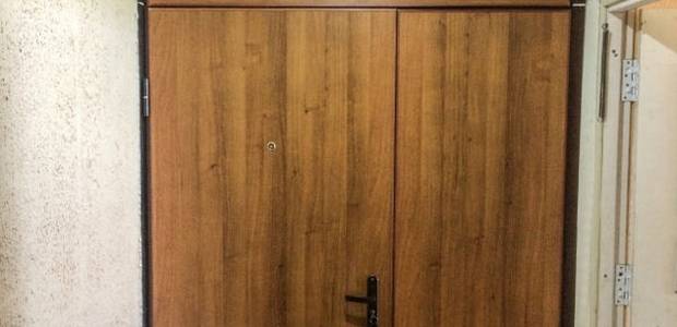 Тамбурная дверь с отделкой ламинатом